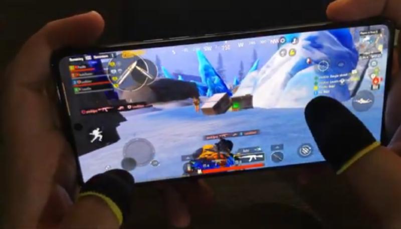 Gaming performance test on Tecno Camon 30 Pro showing PUBG and Genshin Impact gameplay